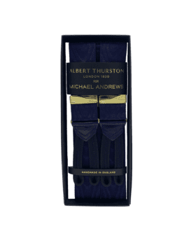 Navy moire suspenders with gold hardware and leather ends, in a gift box