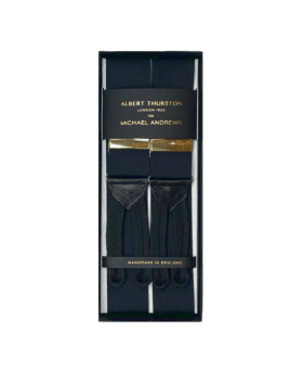 Black solid suspenders with gold hardware and leather ends, in a gift box