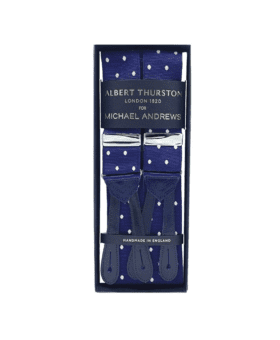 Royal blue suspenders with white dots and silver hardware, in a gift box