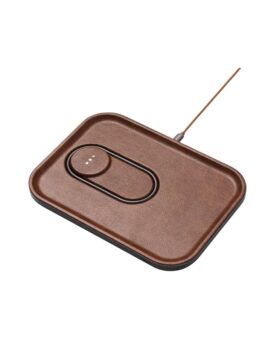 Brown leather wireless charging tray with a recessed charging pad, angled view