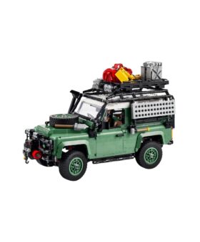 Green Lego Land Rover Defender model with a roof rack and spare wheel