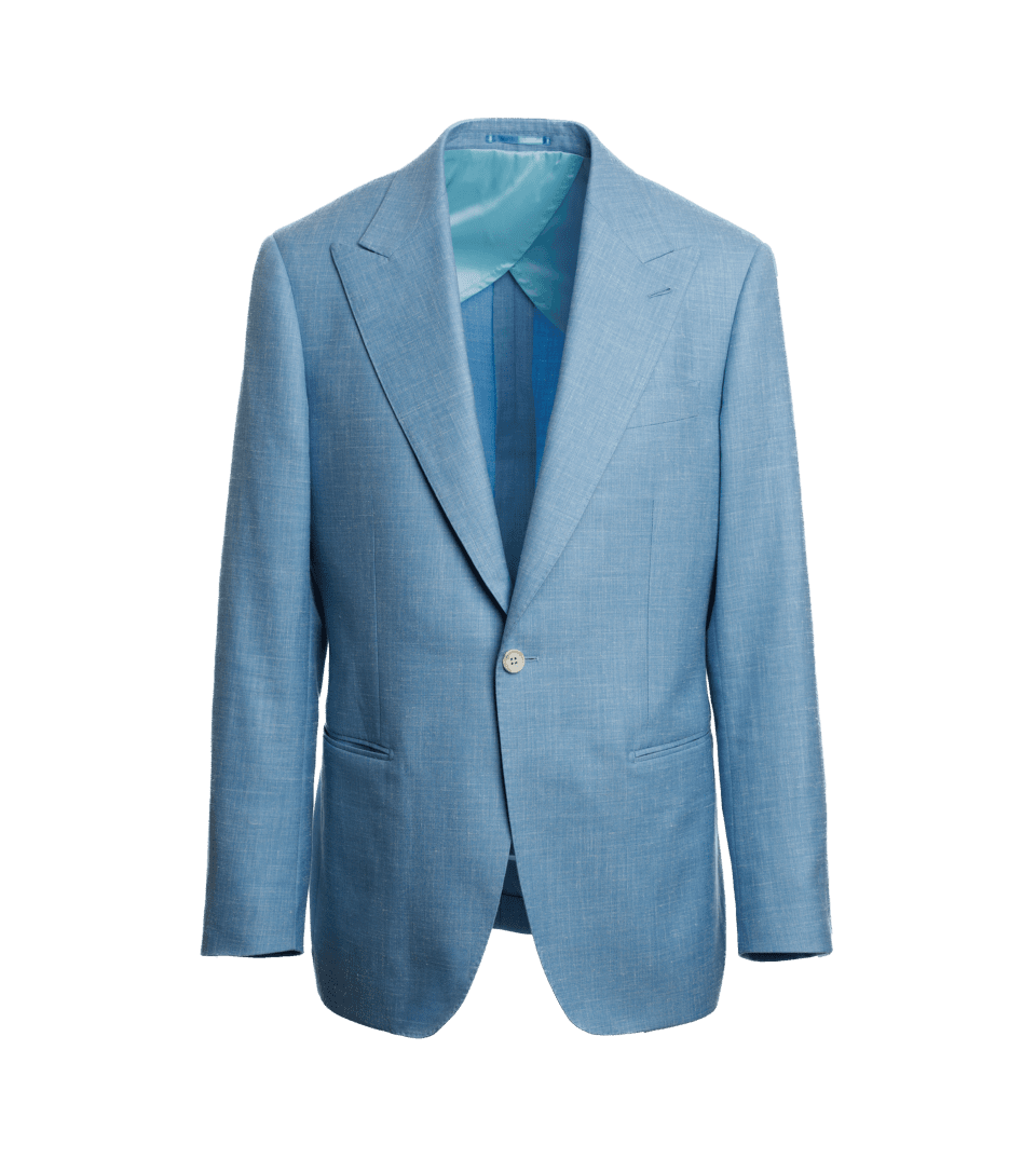Light blue plain twill sport coat with peak lapels and a turquoise lining, on a form