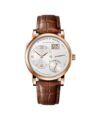 Rose gold dress watch with an off-centre dial, big date and brown alligator strap