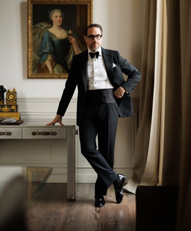 Black mohair tuxedo with bow tie, cummerbund and patent loafers, worn by a model