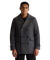 Charcoal grey wool double-breasted peacoat with wide notch lapels, worn open over a black crewneck by a model
