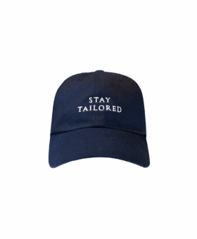 Navy cotton baseball cap embroidered with Stay Tailored in white, front product view