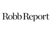 Robb Report wordmark logo in black serif type on a transparent background